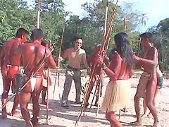 Naughty Japanese girl gets fucked by a tribe in jungles