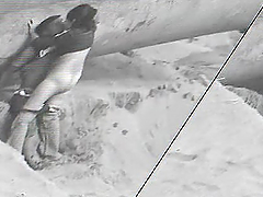 Horny Latina couple has fun near a rock on a beach