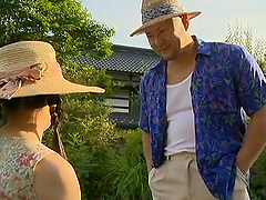 Slutty Japanese chick gets fucked in a village by two dudes
