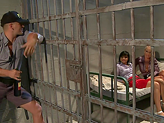 Two sexy whores were detained and fucked by a guard