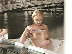 Ivana Sugar pleases herself with fingering in a bathtub
