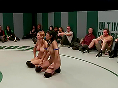 Two lusty babes are torturing one sexy wrestler